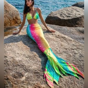 Two (2) mermaid swimsuits.